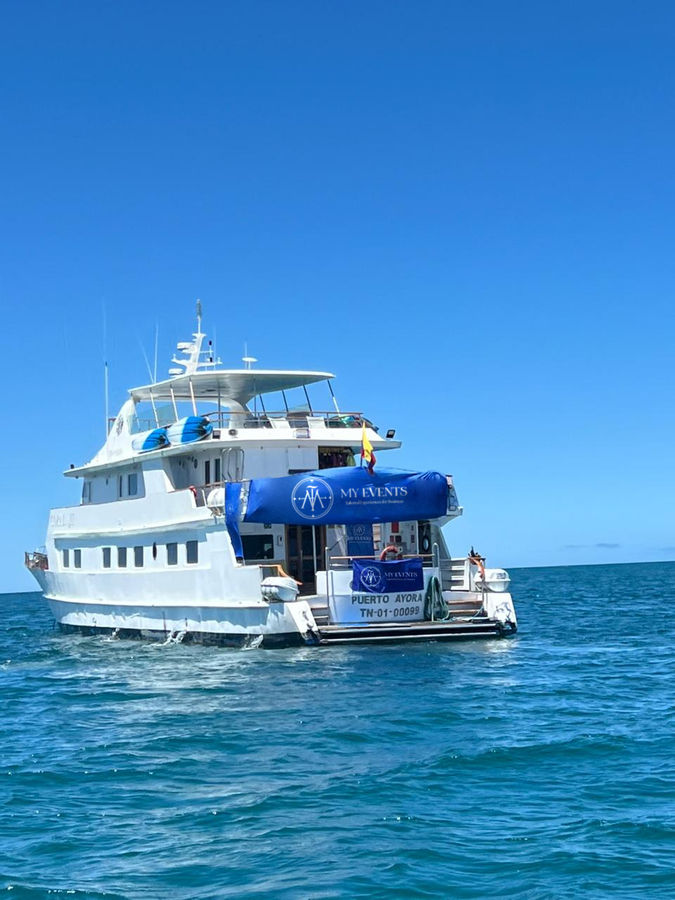 A Galápagos yacht dressed with MY EVENTS banners for an incentive group