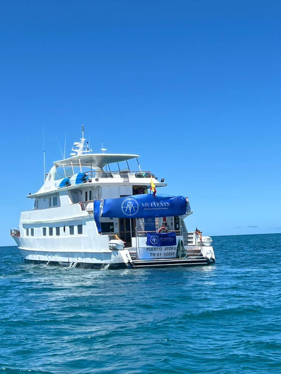 A Galápagos yacht dressed with MY EVENTS banners for an incentive group